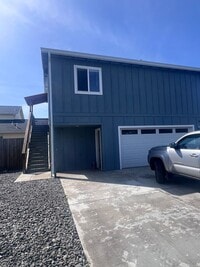Building Photo - 2 Bedroom 1 bath house with extra large double car garage and extra storage space!
