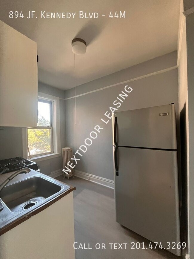 Building Photo - 894 John F. Kennedy Blvd