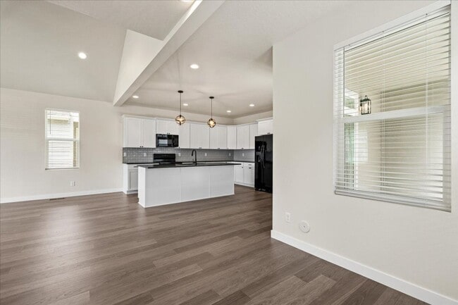 Building Photo - Brand New, Stylish 4-Bedroom Home with Vaulted Ceilings and Private Patio
