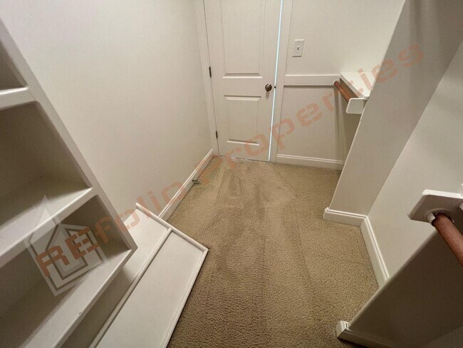 Building Photo - Elegant 3 Story 3 Bedroom Formal Model Tow...