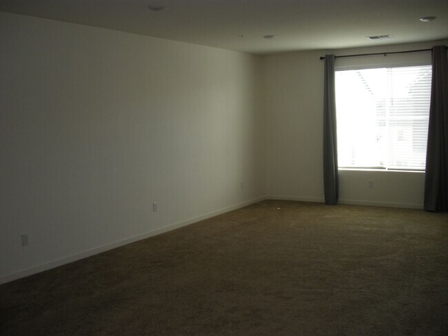 Building Photo - Two Bedroom, Two and and a Half Bath Townh...