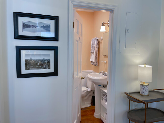 219-bathroom, centrally located in the hallway - 215 W Taylor St