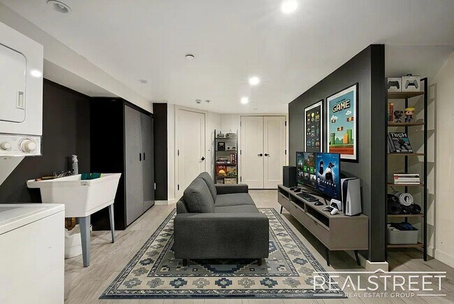 Building Photo - Modern Bushwick 2-bedroom, 2.5-bath duplex with private garden, deck, and finished recreation room —