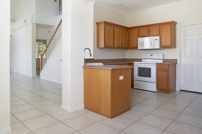 Building Photo - Pinellas Park, Gated Townhome Community 3/...