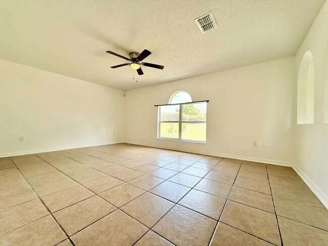 Building Photo - The perfect haven - 4Bedrooms / 2.5Bath family home at Orlando!