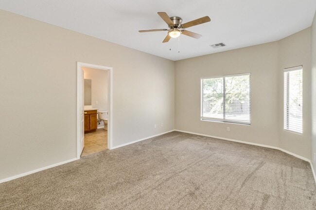 Building Photo - Bright Open Living & a Patio Perfect for Relaxing!