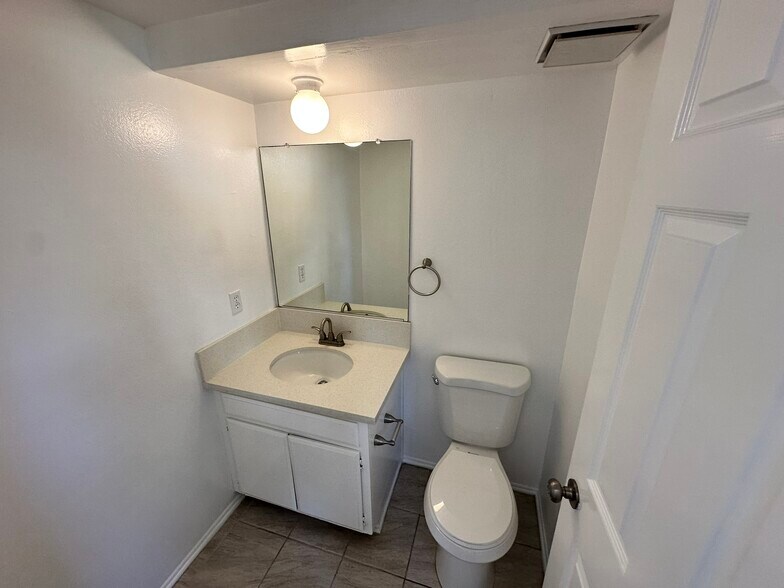 Downstairs Bathroom near Dining Room - 2438 Brittany Woods Ln