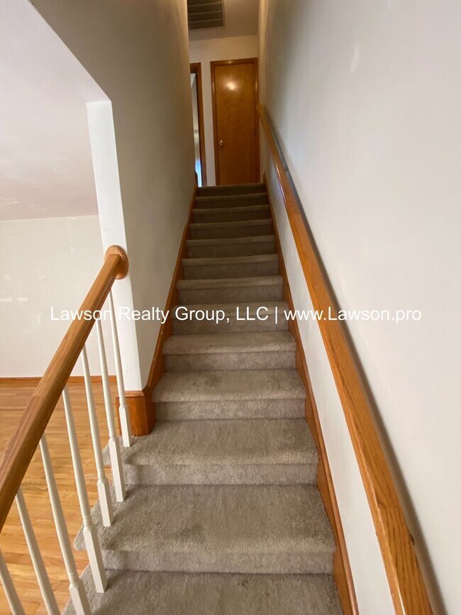 Building Photo - Woodland 5506-5508