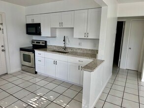 Building Photo - POS Holdings LLC-718-720