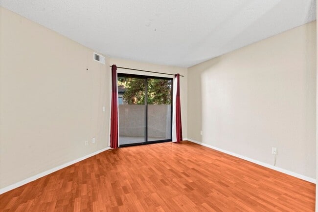 Building Photo - Stylish 1-Bed Condo with Balcony, Garage & Resort-Style Amenities in Mira Mesa