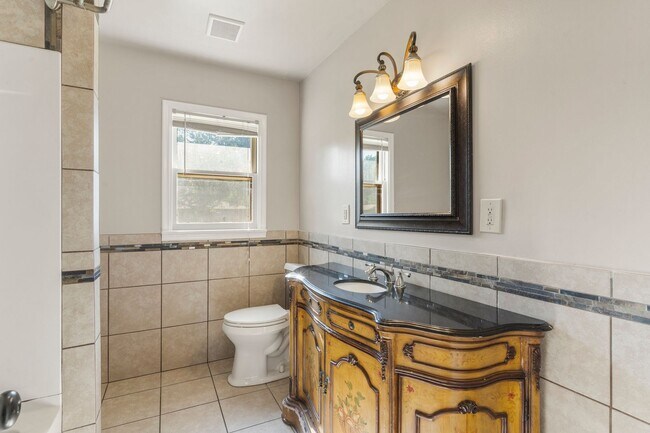 Building Photo - Newly renovated home with a large yard per...