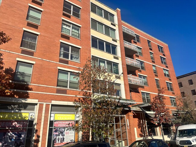 Building Photo - Spacious 5th-Floor Two-Bedroom at The Aurora