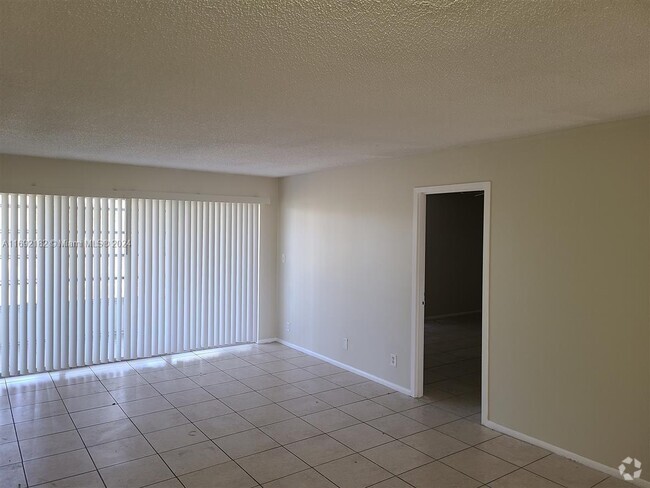 Building Photo - 8411 Lagos de Campo Blvd