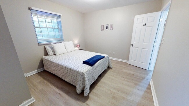 Building Photo - THE UNION GROVE | Gorgeous renovated home in Lithonia featuring large common areas, a spacious ki...