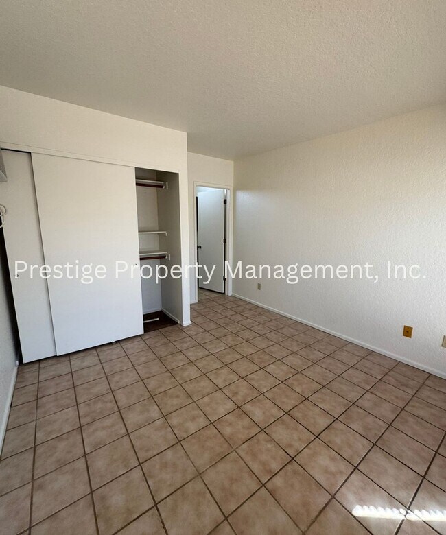 Building Photo - Totaling 3/3 With The Guest House; This Lovely Central Townhome is Everything You Need!