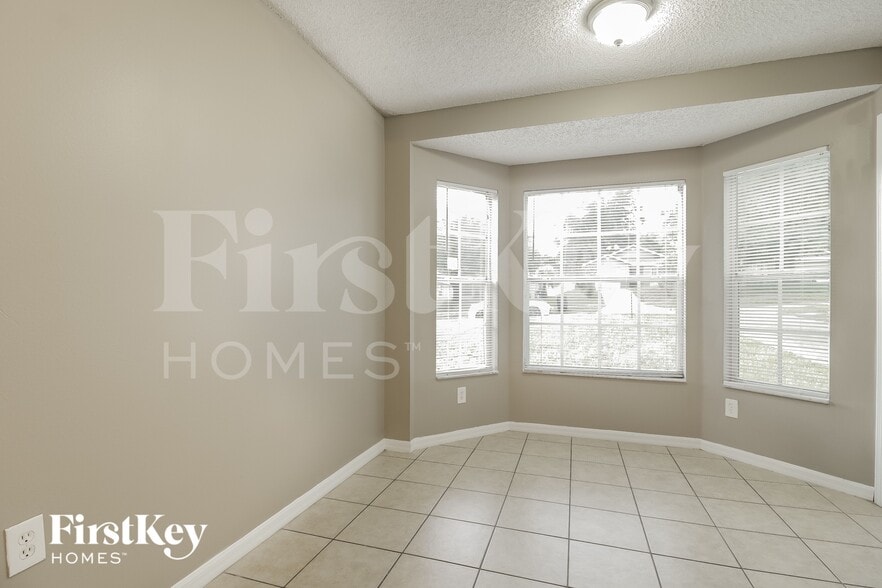 Building Photo - 7560 Groveoak Dr