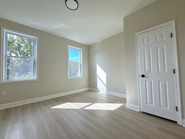 Building Photo - Modern 3BR Rowhome with Finished Lower Level & Rear Deck