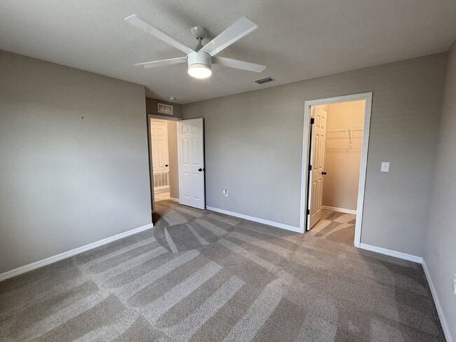 Building Photo - Spacious 4-Bedroom Retreat with additional office/den in the Heart of Trinity!