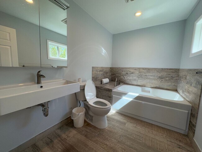 Building Photo - Large Open Layout Nestled in a Quiet Neighborhood with Stunning Mountain Views