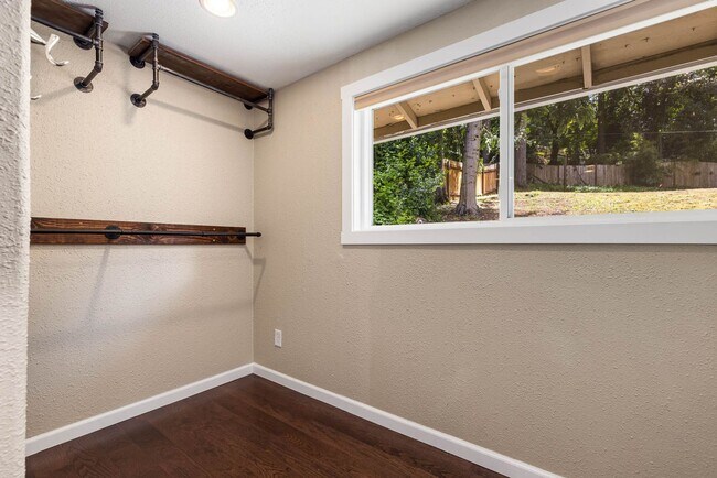 Building Photo - Updated Charmer with Open Kitchen, Private Yard & 2-Car Garage