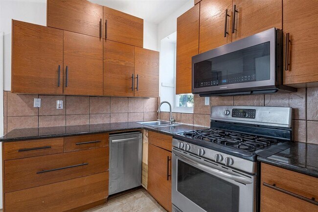 Building Photo - 310 Paterson Plank Rd