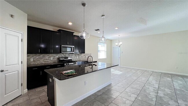 Building Photo - 7755 Purple Finch St