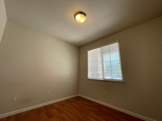 Building Photo - Fireplace in Living Room, Backyard Patio, Hardwood and Laminate Flooring