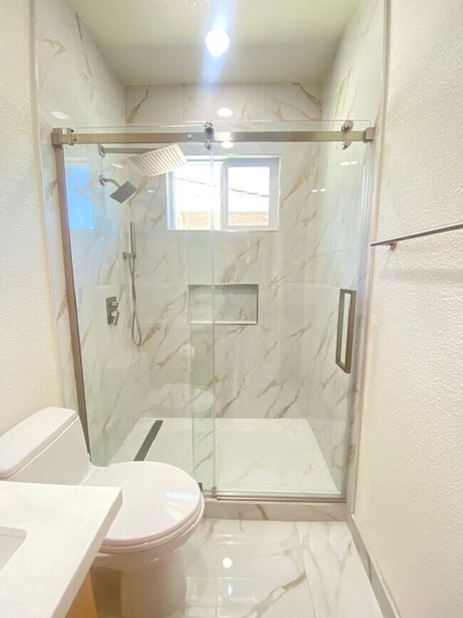 Building Photo - Spacious 5-Bedroom Home with Solar, Stunning Sunroom & Upgraded Bathrooms!