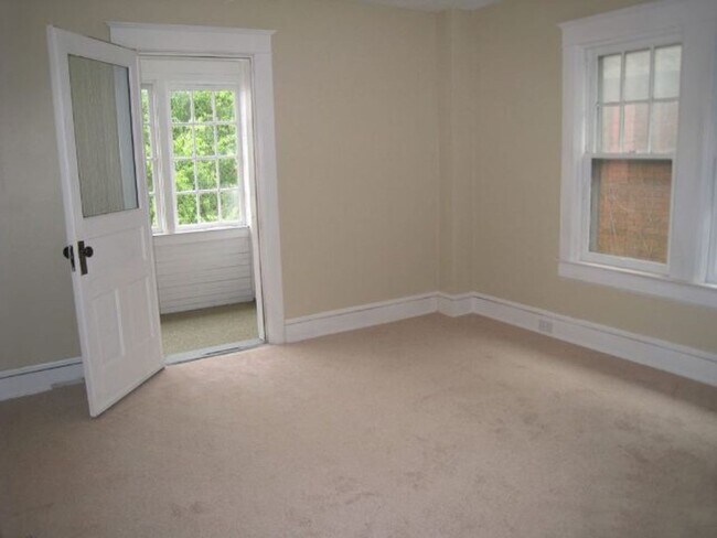 Building Photo - 3 BR Home with Natural Light, Covered Porches & Bonus Sunroom