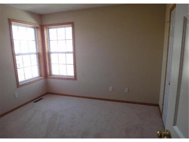 Building Photo - 9012 Garland Ln N