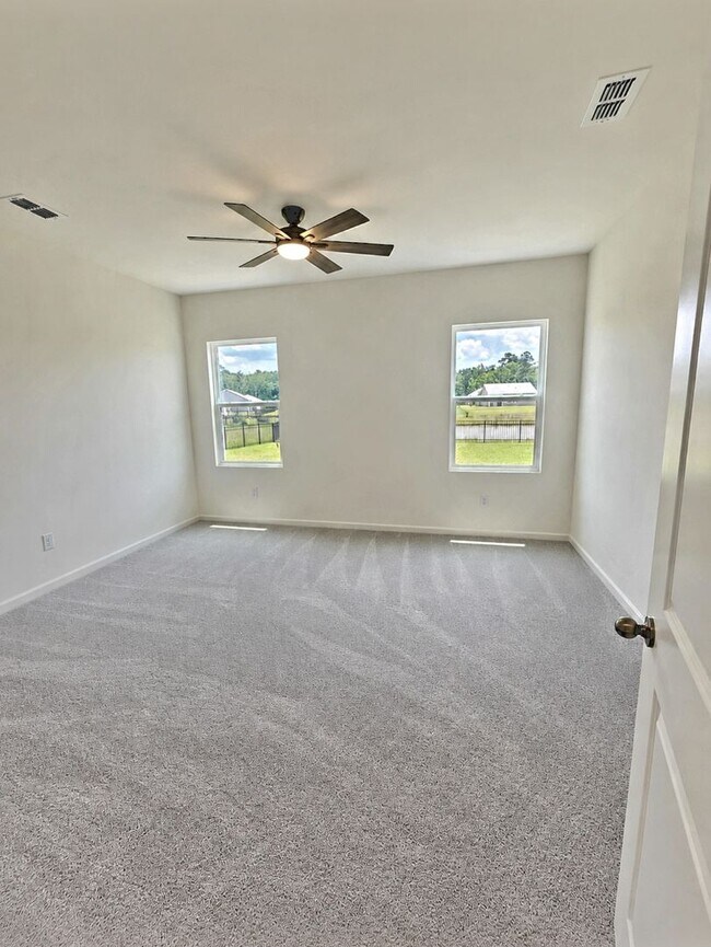 Building Photo - Be the First to Call This Brand-New Pond View Home Yours!