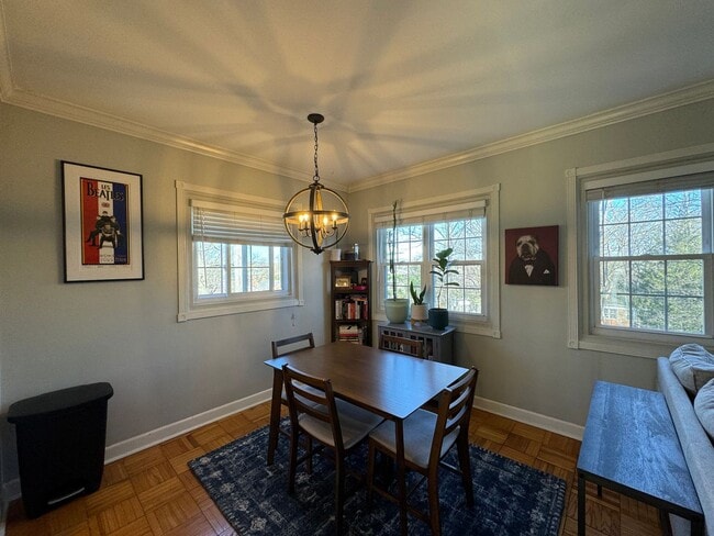 Building Photo - Charming 1 Bed 1 Bath End Unit Condo In Am...