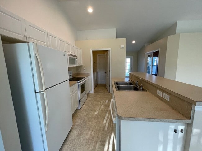 Building Photo - PRICE REDUCTION: Spacious and Charming 3 B...