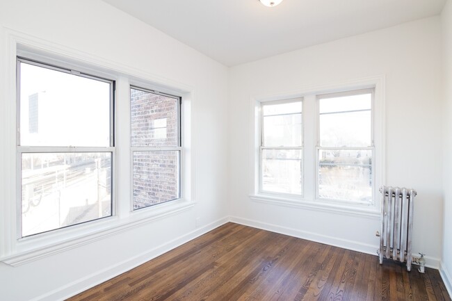 Building Photo - 6573 N Lakewood Ave