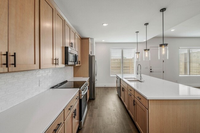 Building Photo - Brand NEW 4 Bedroom 4.5 Bathroom Townhome at The Urban Available for June Pre-lease!