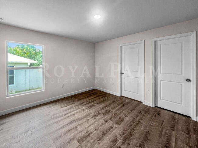 Building Photo - Spacious 3BR/2BA Duplex in Lehigh Acres & $500 Off Your First Month If You Apply by Aug 20th!