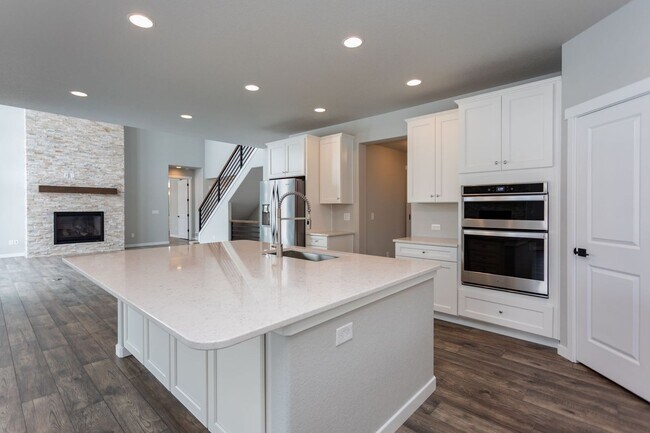 Building Photo - Exceptional 4-Bedroom Home with Dual Fireplaces, Main Level Master Suite, and Spacious Basement -...