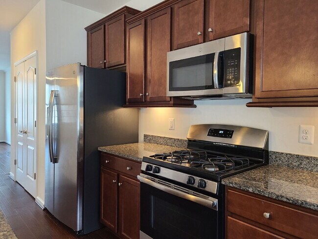 Building Photo - 3-Story Townhouse with Attached Garage in ...