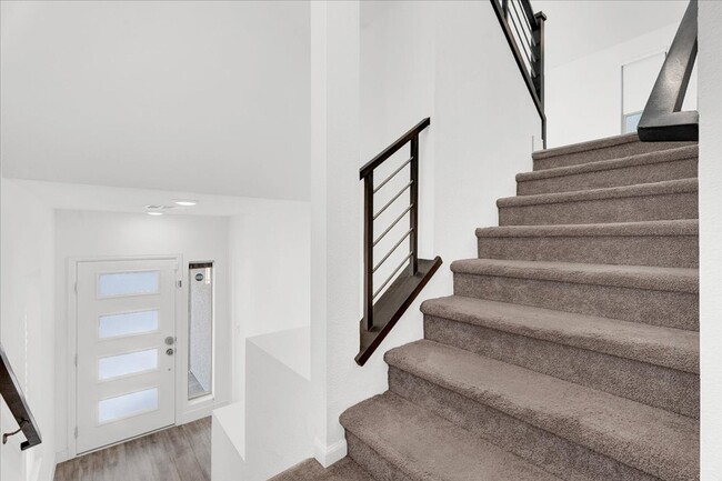 Building Photo - Stunning 4-Bedroom Home in Gated Community Near I-215 & Top Amenities!