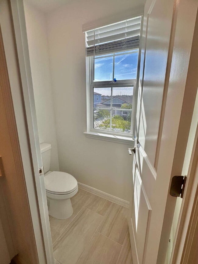 Building Photo - 8406 Blue Wave Ln E