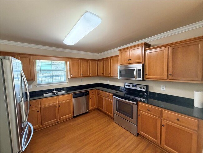 Building Photo - 9646 Estate Dr