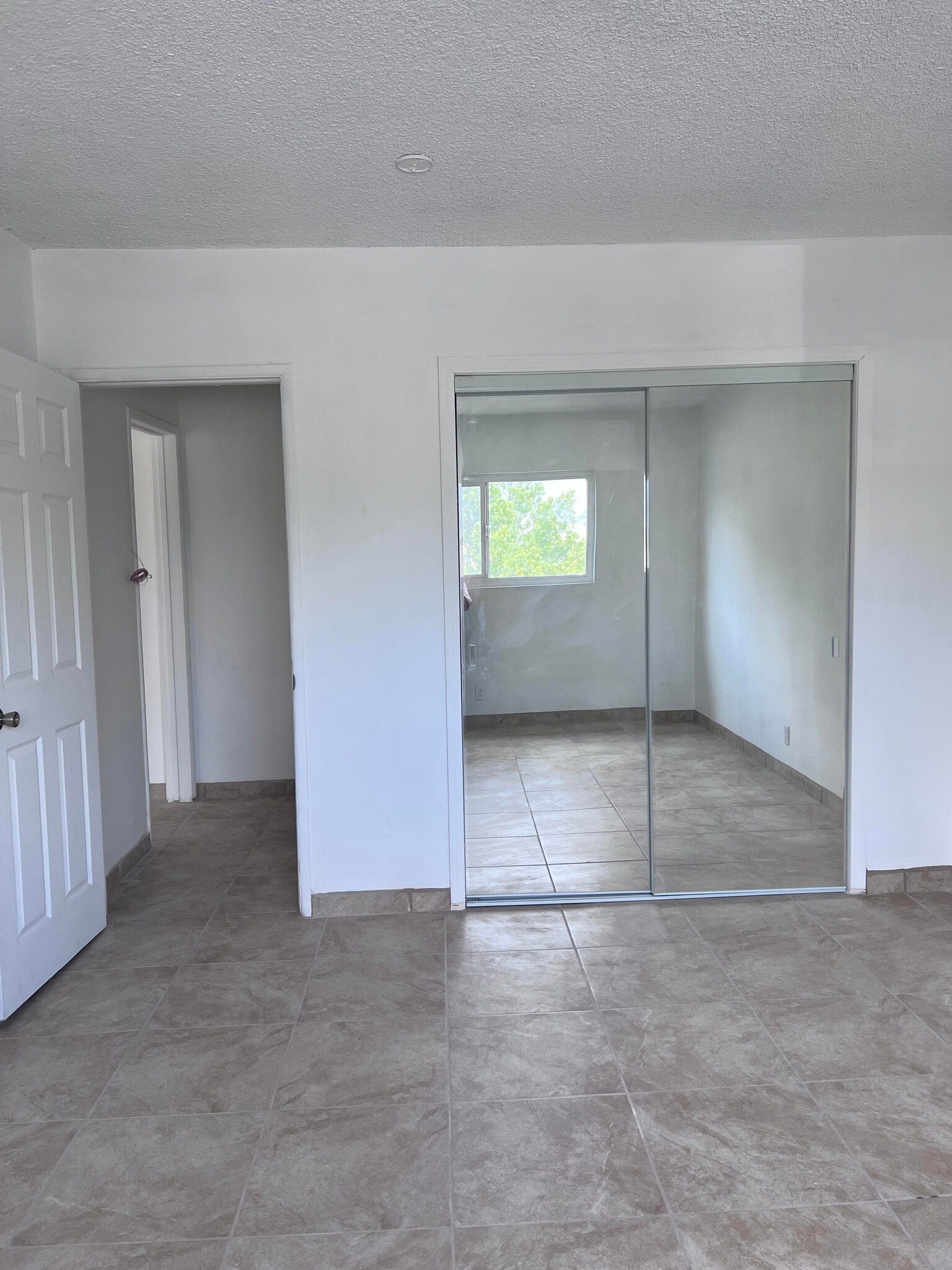 Mirrored bedroom closet - 412 Calle Cinco