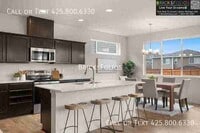 Building Photo - Live Brand-New in the Heart of It All. Lak...