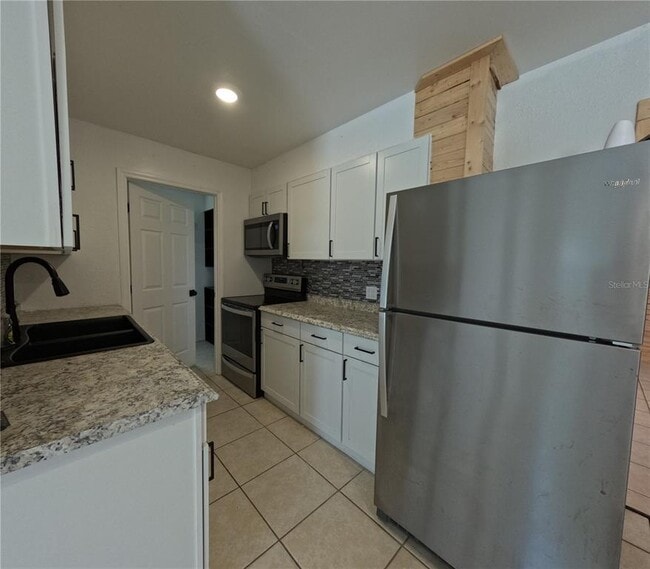 Building Photo - 809 Plumosa Ave