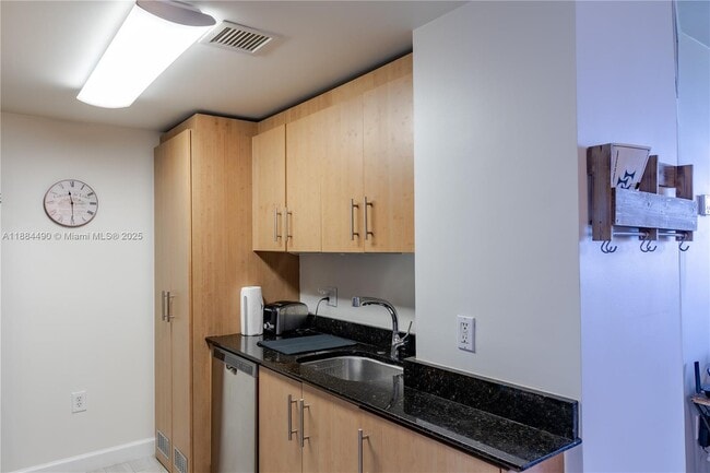 Building Photo - 10275 Collins Ave