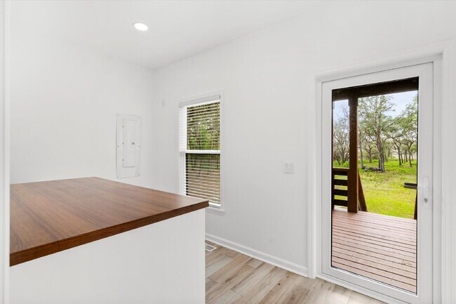 Building Photo - "Spacious 4-Bed Oasis with Guest Suite on Johns Island - Your Dream Home Awaits!"