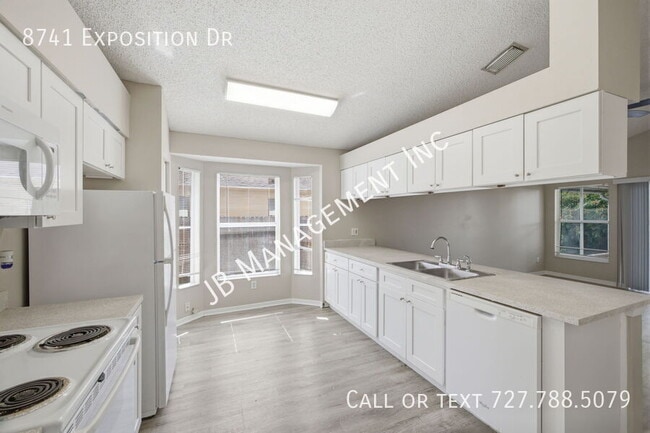 Building Photo - 8741 Exposition Dr