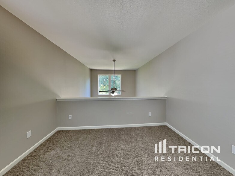 Building Photo - 9312 Tiger Lily Ln
