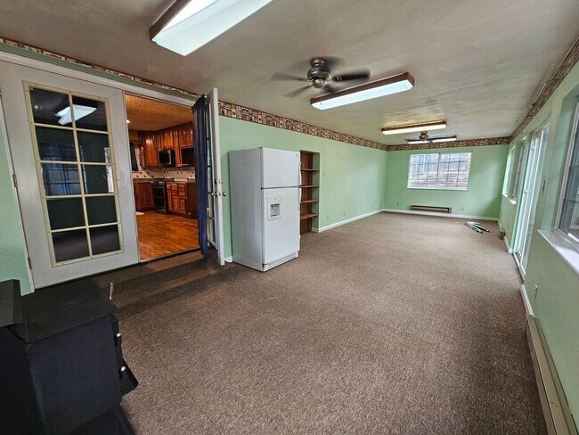 Building Photo - 4-Bedroom Home with In-Ground Pool, Solar ...