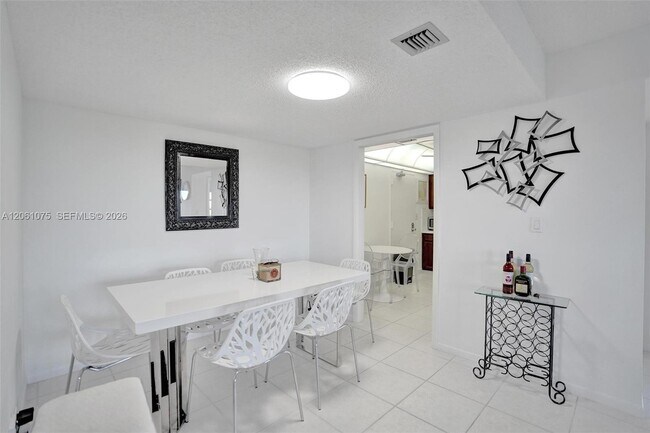 Building Photo - 10777 W Sample Rd
